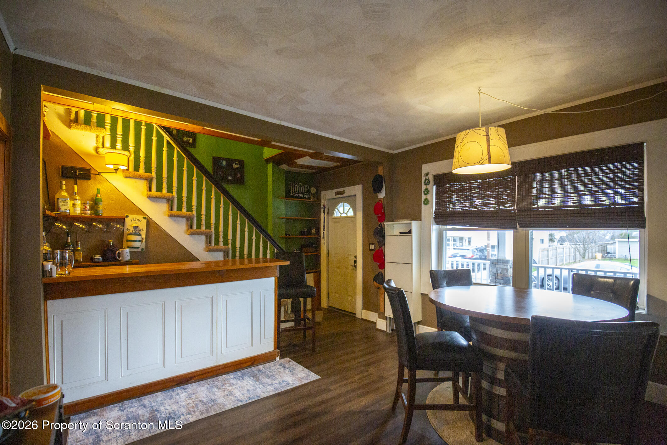 3245 Cedar Avenue Scranton, PA 18505 - Photo 14 of 37 a view of a dining room with furniture window and wooden floor