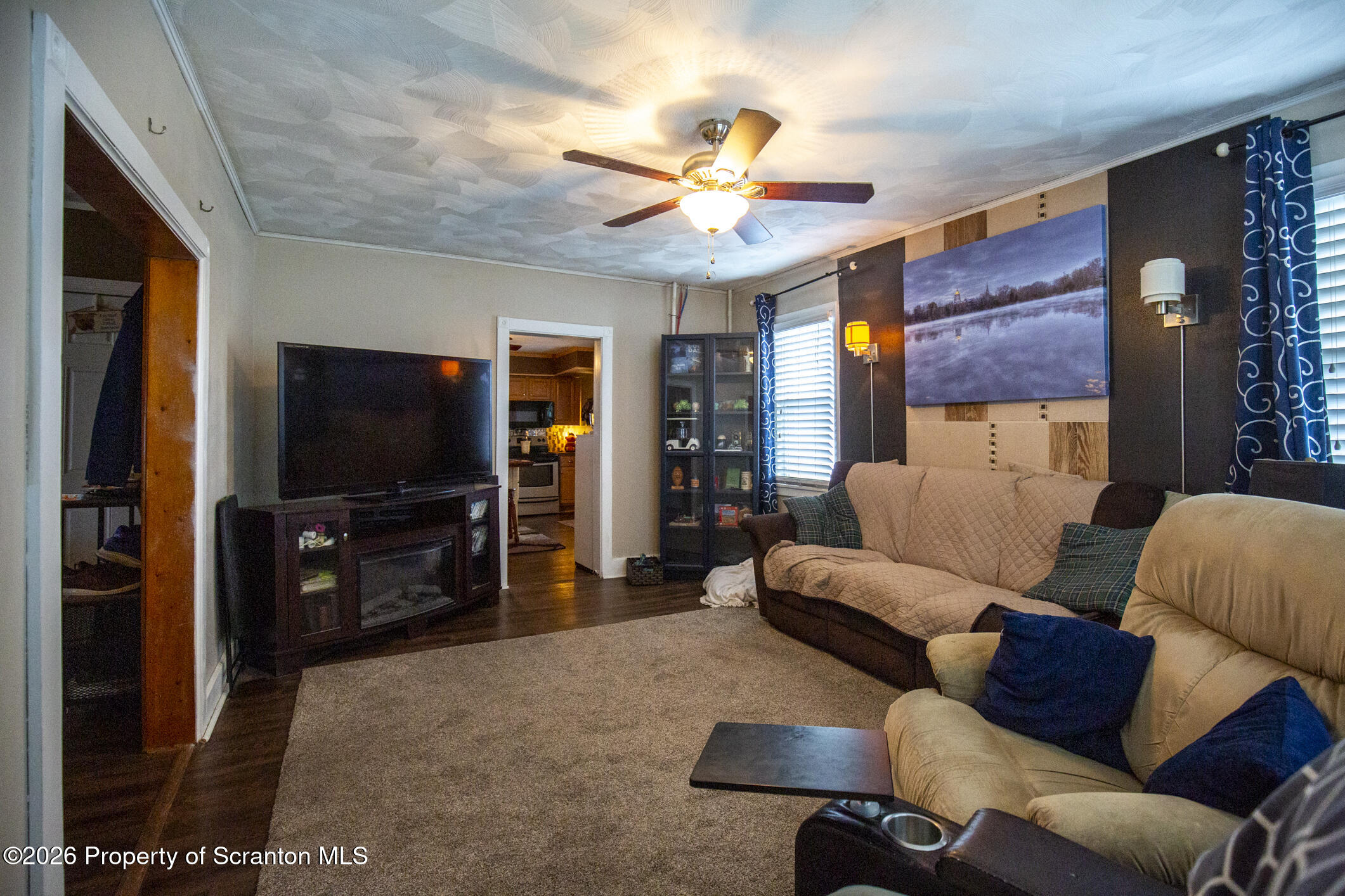 3245 Cedar Avenue Scranton, PA 18505 - Photo 18 of 37 a living room with furniture and a flat screen tv