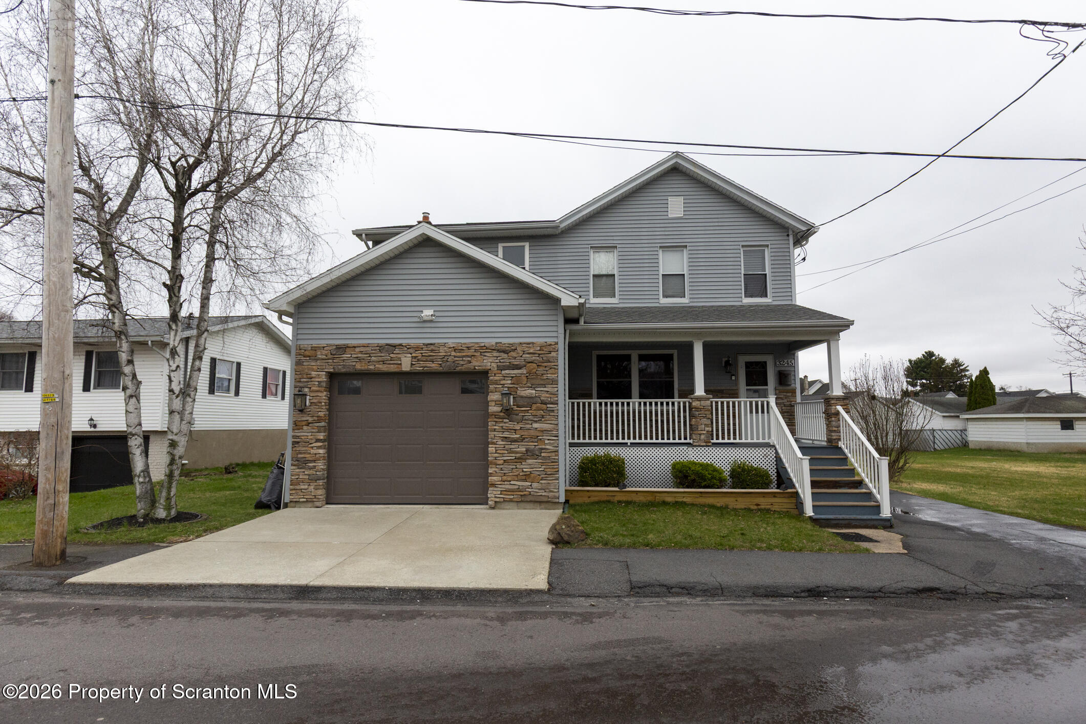 3245 Cedar Avenue Scranton, PA 18505 - Photo 2 of 37 a front view of a house with garden