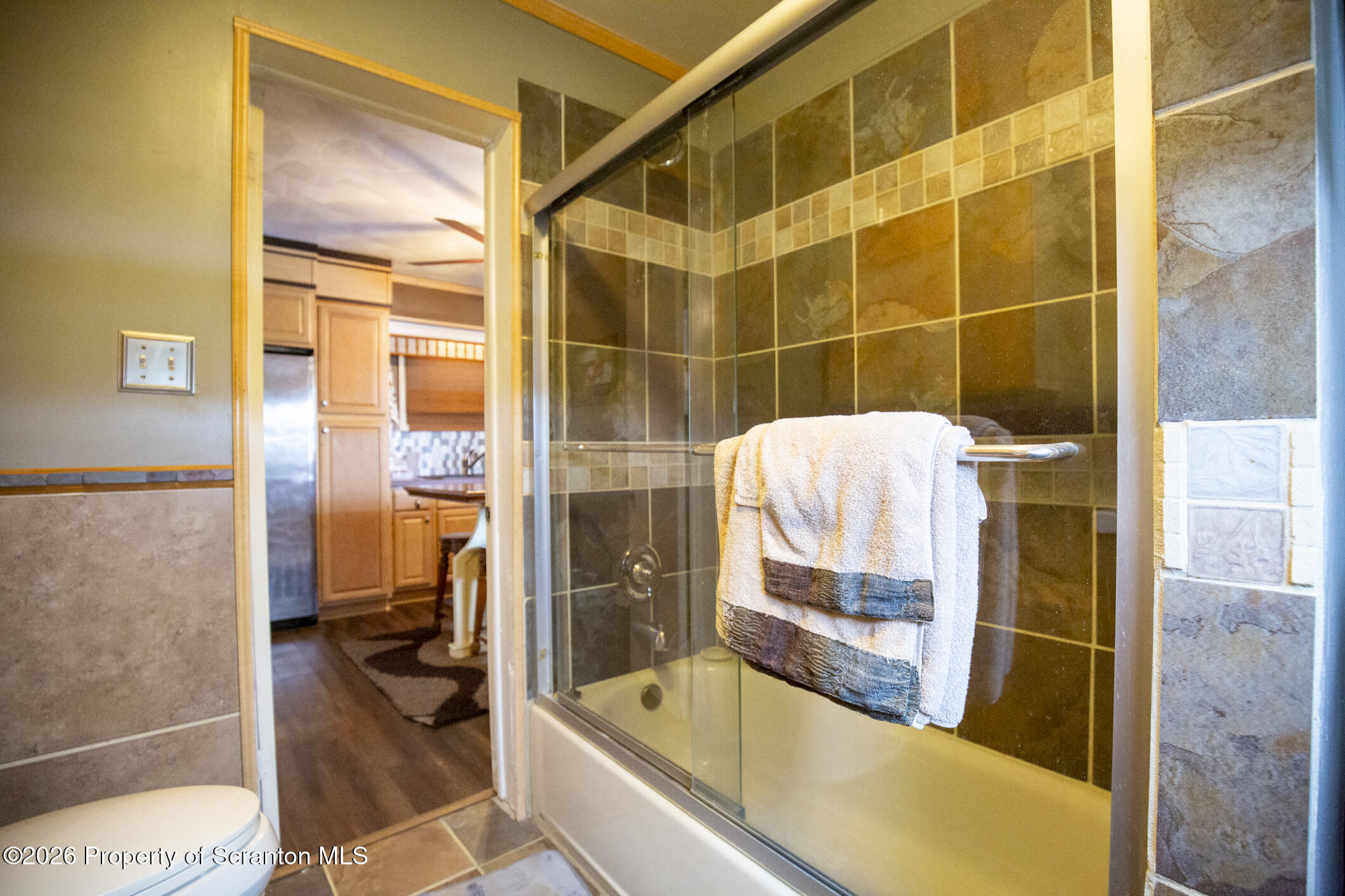 3245 Cedar Avenue Scranton, PA 18505 - Photo 23 of 37 a bathroom with a tub and a shower