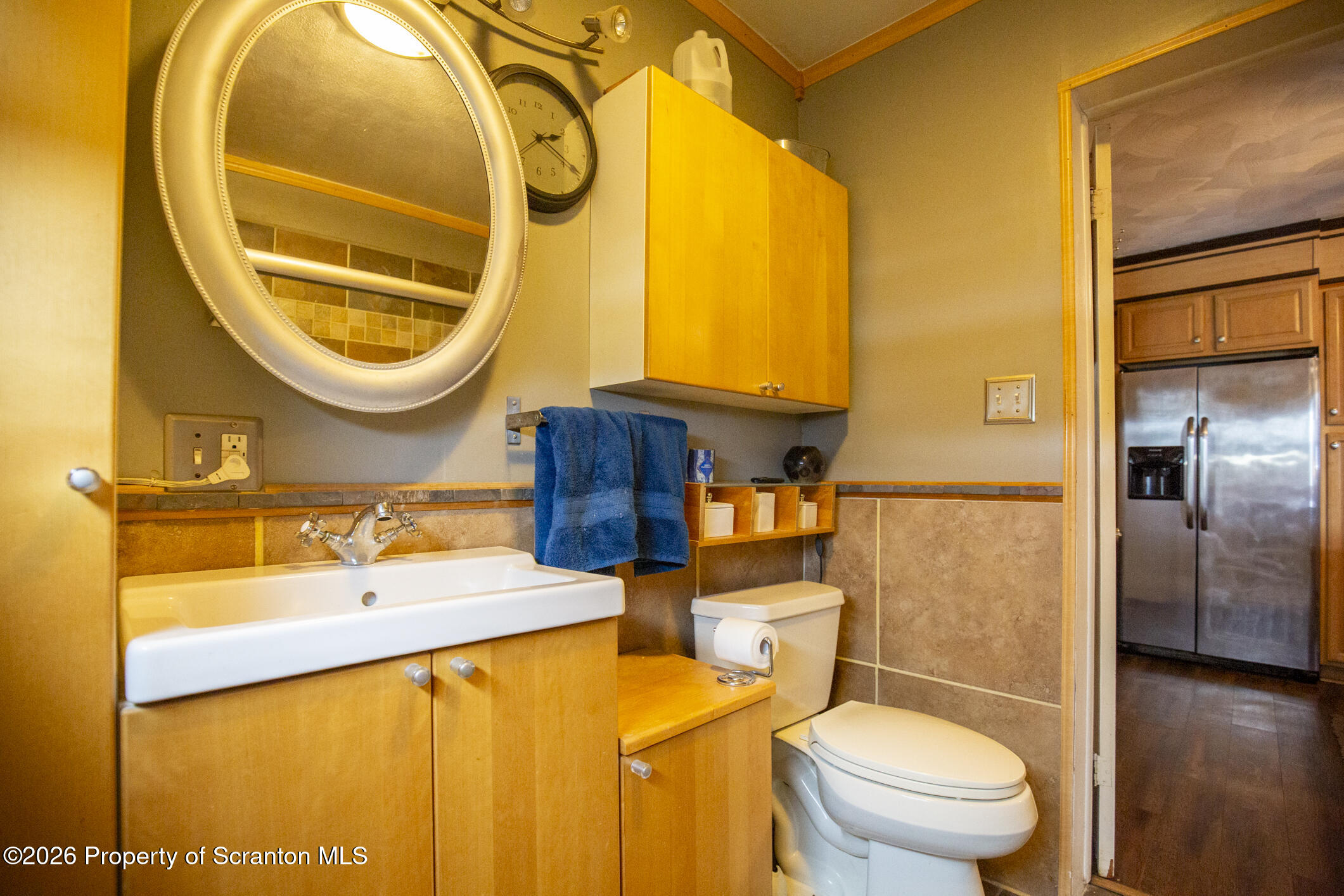 3245 Cedar Avenue Scranton, PA 18505 - Photo 24 of 37 a bathroom with a sink and a mirror
