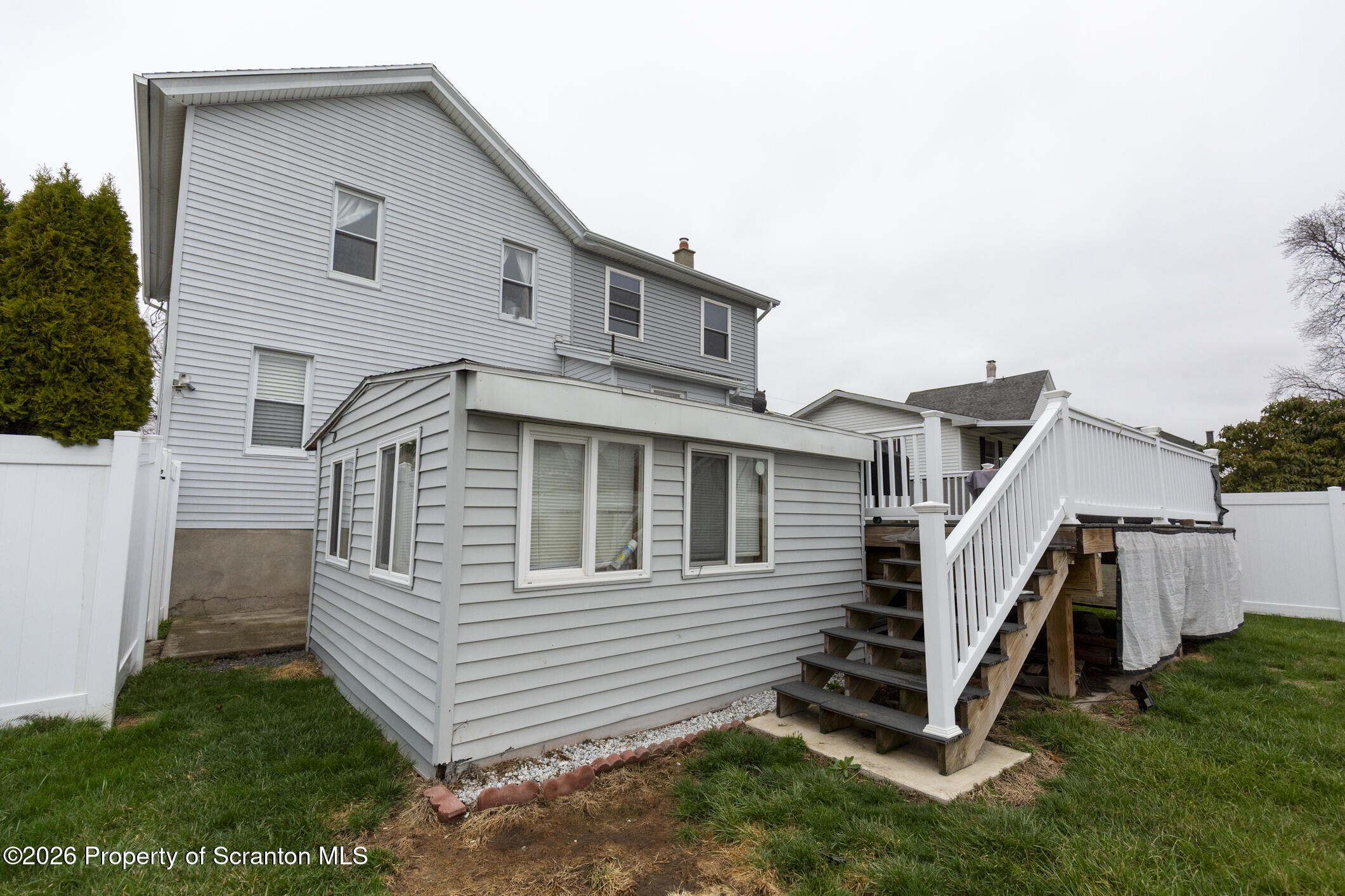 3245 Cedar Avenue Scranton, PA 18505 - Photo 5 of 37 a front view of a house with a yard