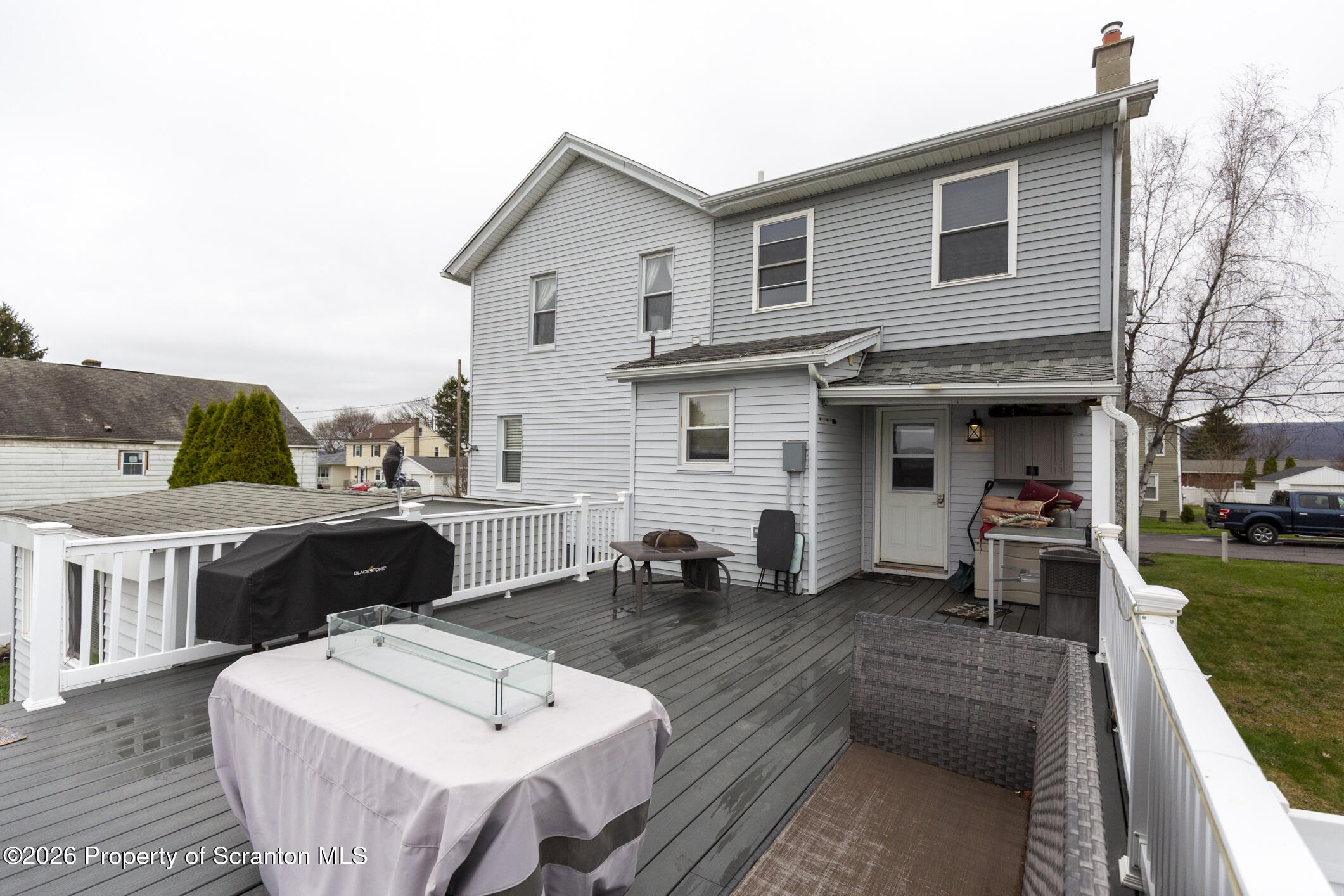 3245 Cedar Avenue Scranton, PA 18505 - Photo 6 of 37 a view of a house with a patio