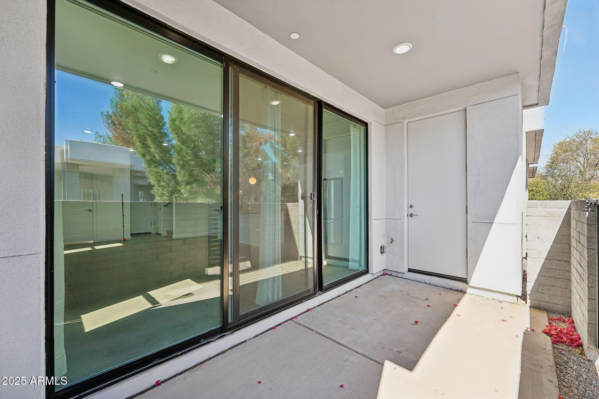 225 North Pleasant Drive, Unit 30 Chandler, AZ 85225 - Photo 11 of 34 a bathroom with a glass shower door and a sink