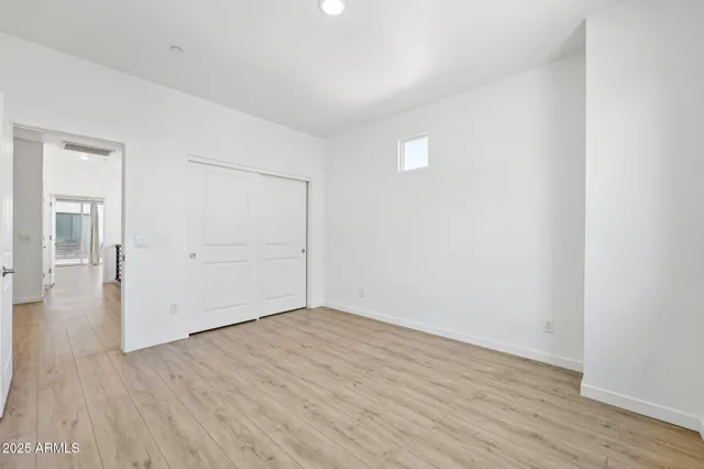 a bathroom with 2 sink and a mirror
