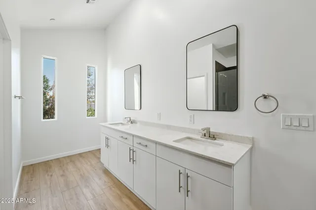 a view of a house with swimming pool and sitting area