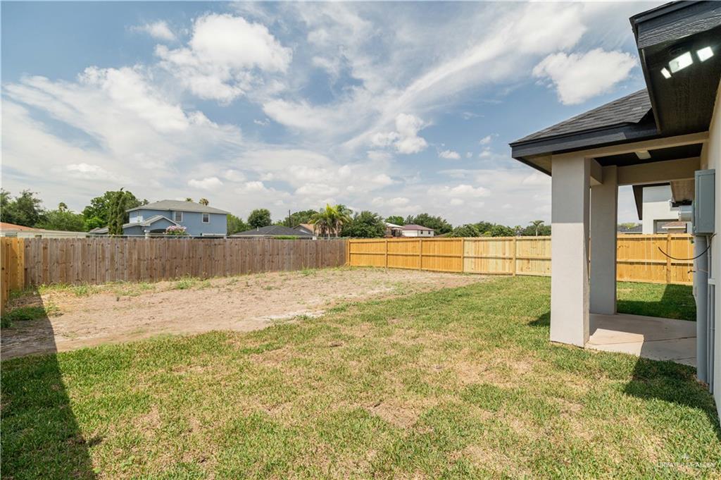 2118 Trinity Street Donna, TX 78537 - Photo 12 of 13 a view of a yard with an outdoor space