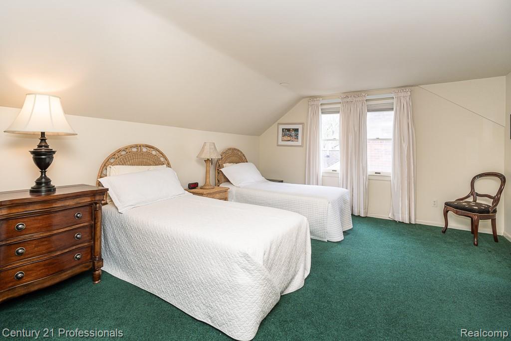 304 Highland Avenue Rochester, MI 48307 - Photo 14 of 30 Room with sloped ceilings and green carpet