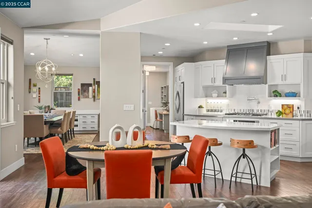 a view of a dining room with furniture window and outside view