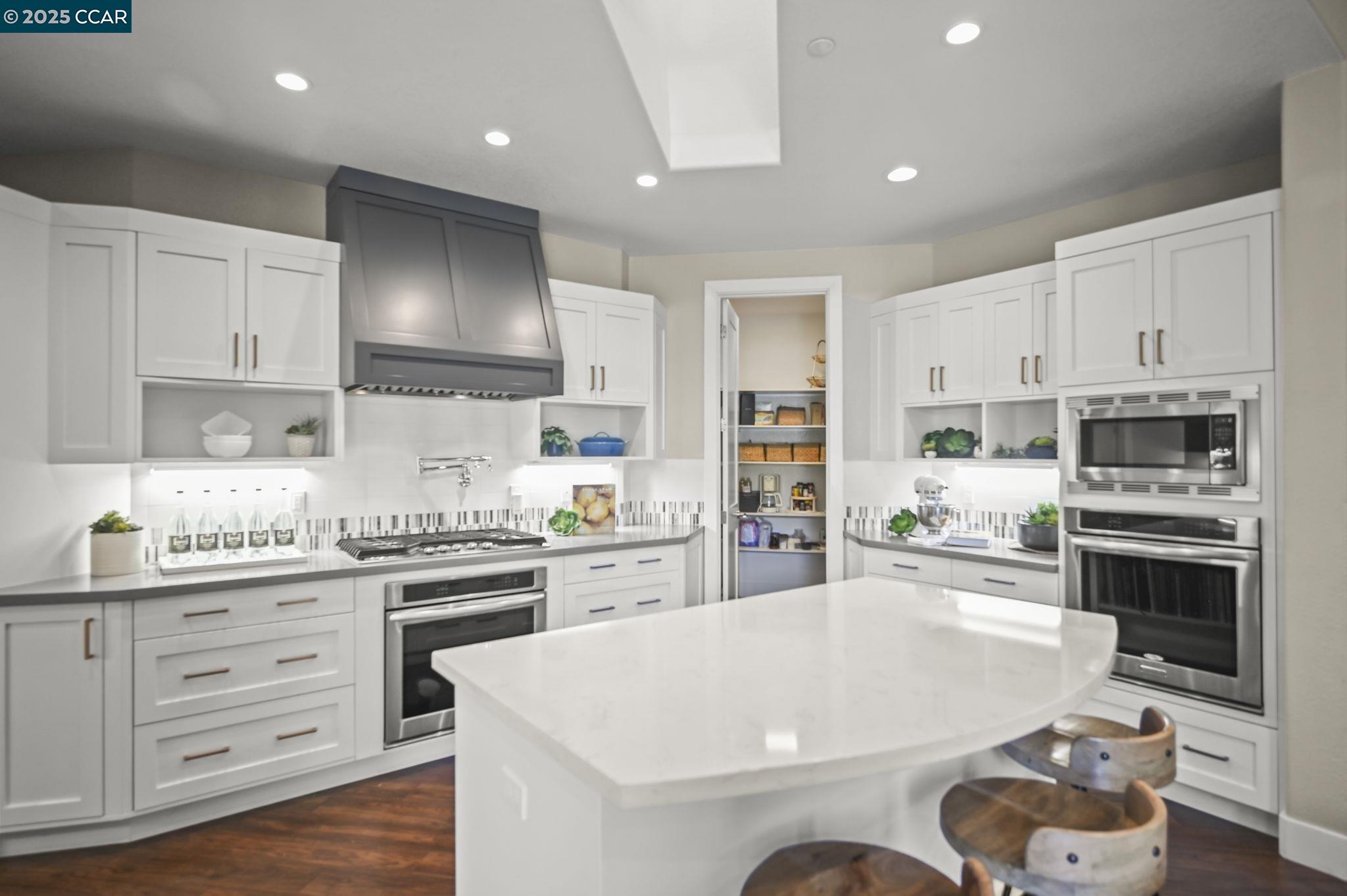 1096 Mountain View Boulevard Walnut Creek, CA 94596 - Photo 15 of 49 a kitchen with granite countertop a sink stainless steel appliances and cabinets
