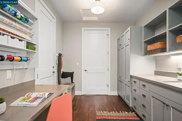 a bedroom with a bed running cycle and a window