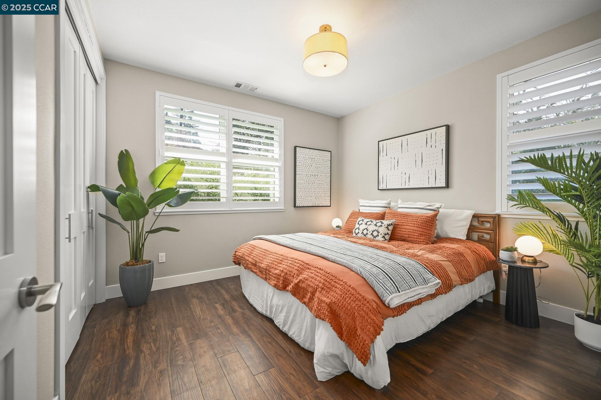 1096 Mountain View Boulevard Walnut Creek, CA 94596 - Photo 24 of 49 a bedroom with a bed running cycle and a window