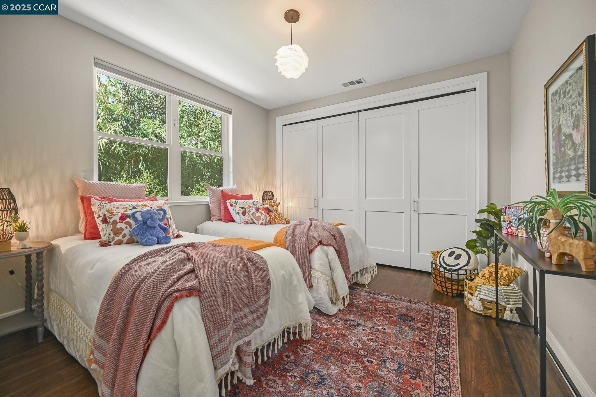 1096 Mountain View Boulevard Walnut Creek, CA 94596 - Photo 26 of 49 a bed room with a bed and a potted plant