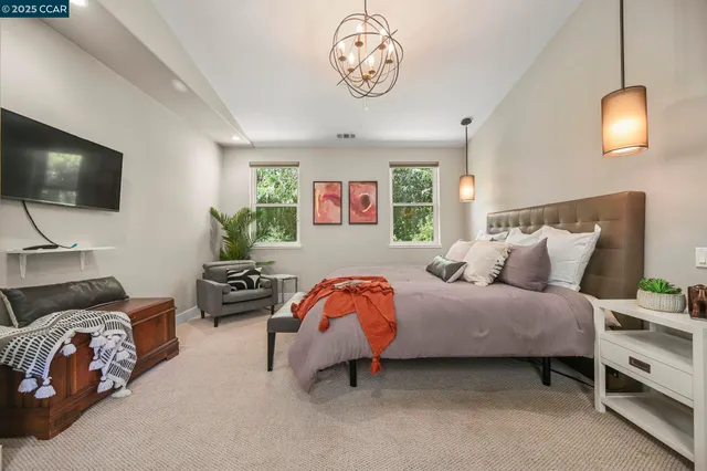 a en suite bathroom with a sink and a mirror