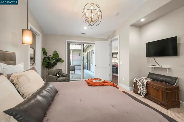 a bathroom with double vanity sinks and a mirror