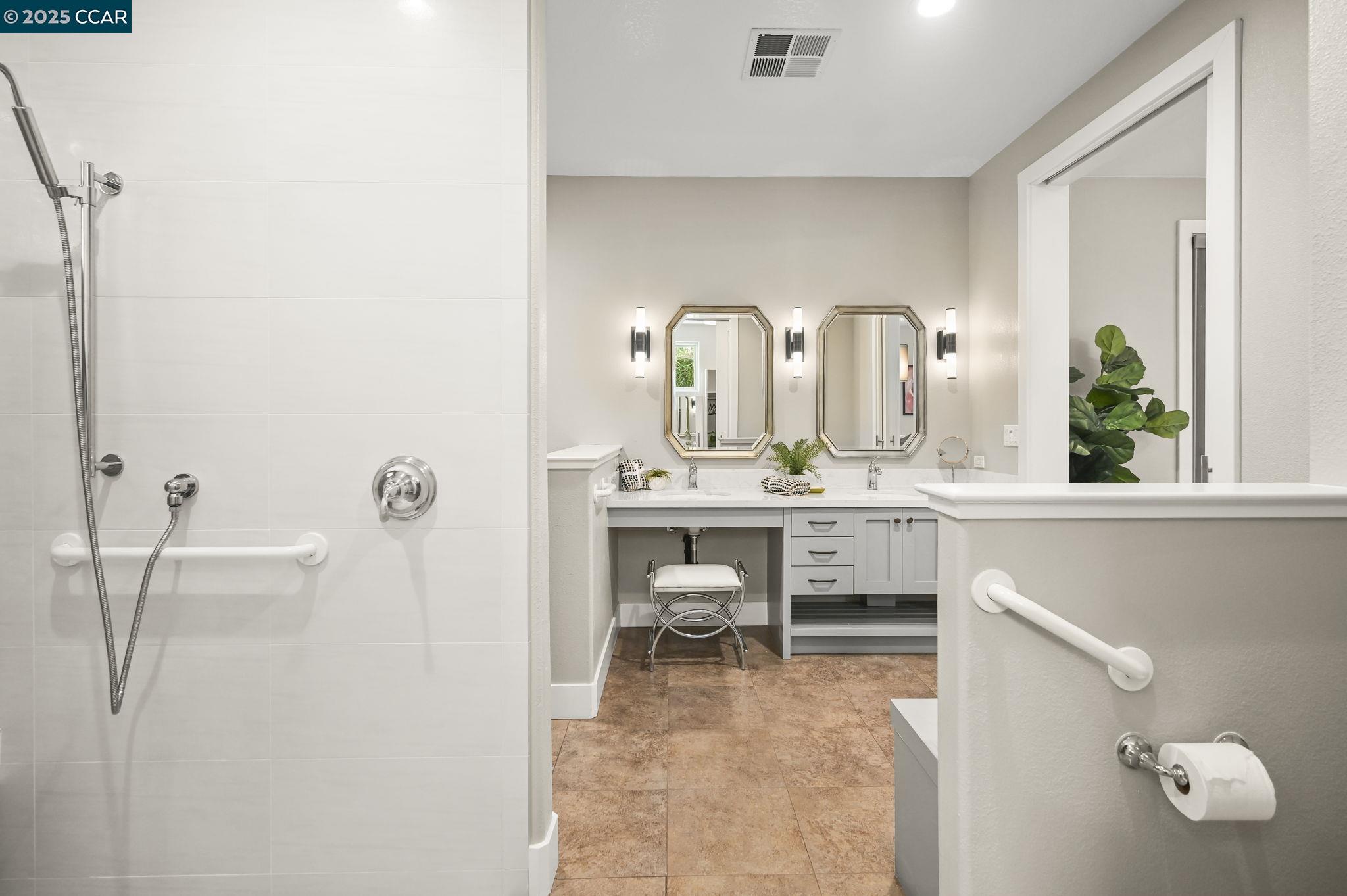 1096 Mountain View Boulevard Walnut Creek, CA 94596 - Photo 29 of 49 a en suite bathroom with a sink and a mirror