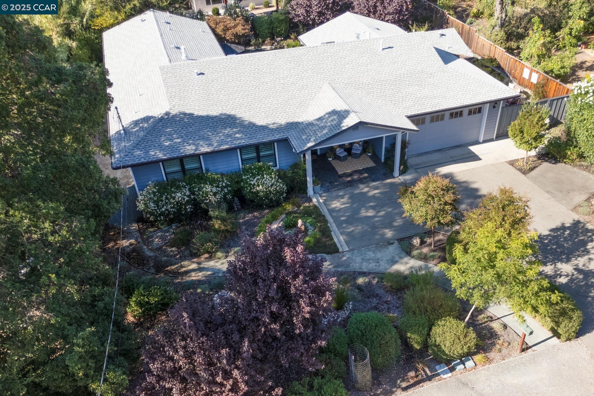 1096 Mountain View Boulevard Walnut Creek, CA 94596 - Photo 47 of 49 a aerial view of a house with a yard and large tree