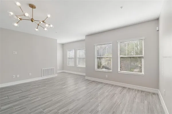 a view of a livingroom with wooden floor