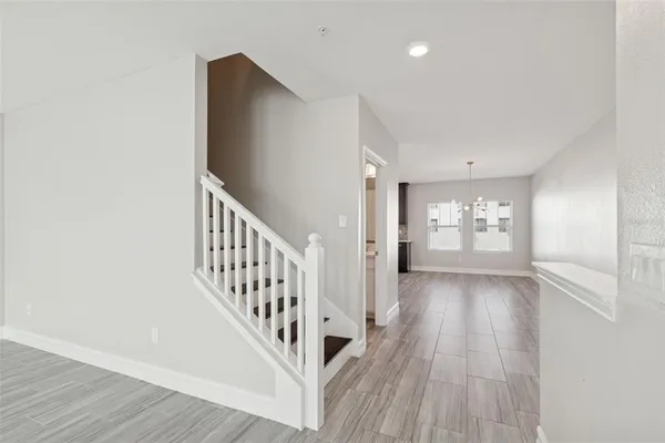 a large kitchen with stainless steel appliances kitchen island a large island in the center