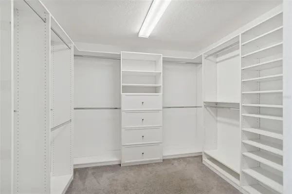 a bathroom with a bathtub and a toilet