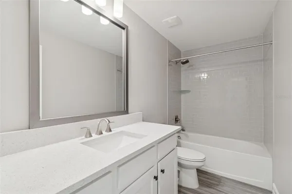 an aerial view of a house with a ocean view