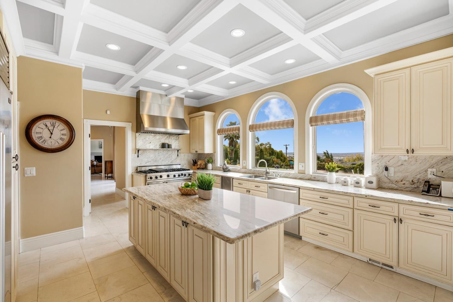 10340 Anderson Road San Jose, CA 95127 - Photo 12 of 65 a kitchen with stainless steel appliances granite countertop a lot of white cabinets and a large window
