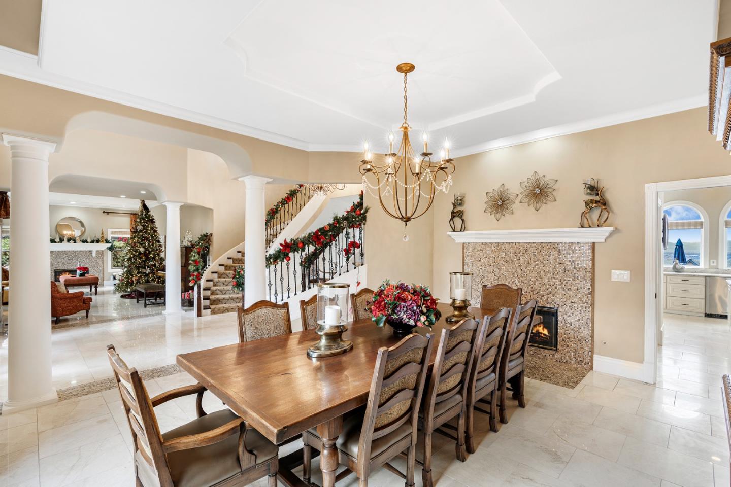 10340 Anderson Road San Jose, CA 95127 - Photo 13 of 65 a view of a dining room and livingroom with furniture wooden floor a chandelier