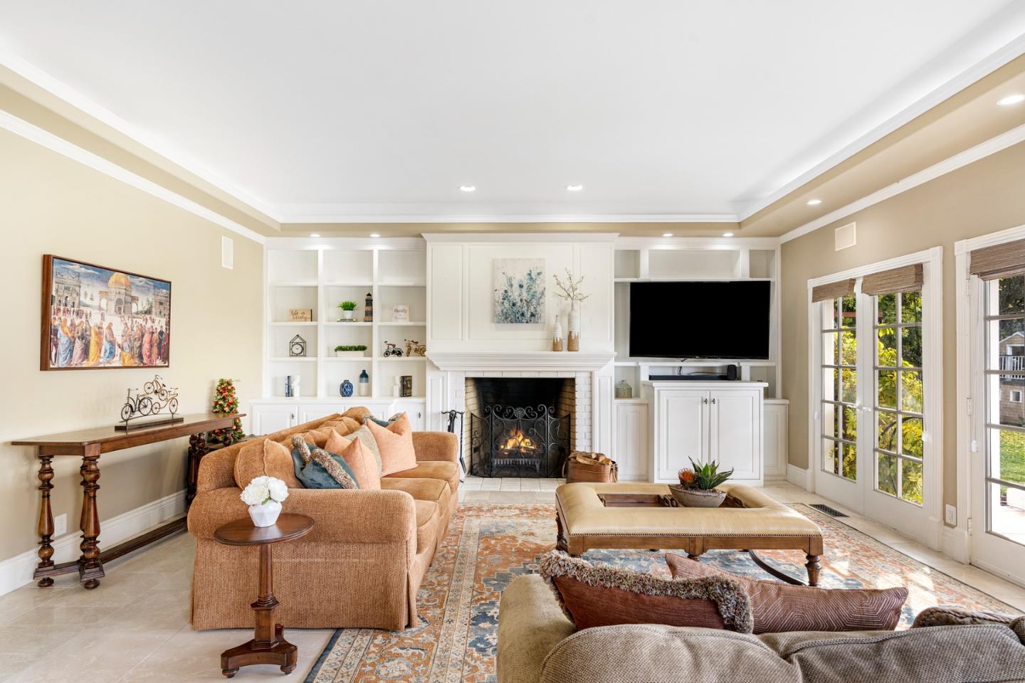 10340 Anderson Road San Jose, CA 95127 - Photo 14 of 65 a living room with furniture a fireplace and a flat screen tv