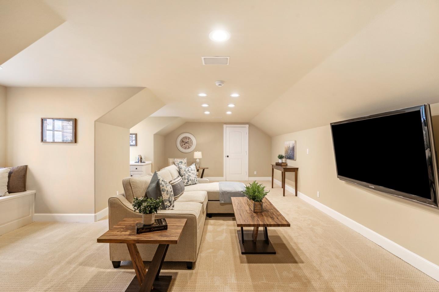 10340 Anderson Road San Jose, CA 95127 - Photo 17 of 65 a living room with furniture and a flat screen tv