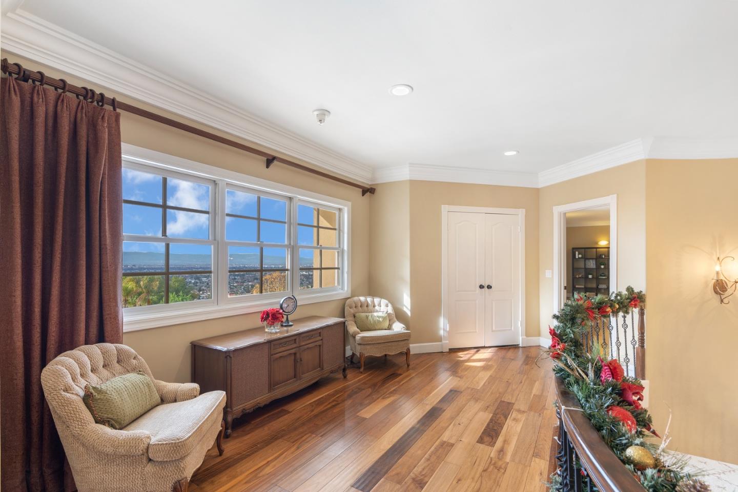 10340 Anderson Road San Jose, CA 95127 - Photo 19 of 65 a living room with furniture and a large window
