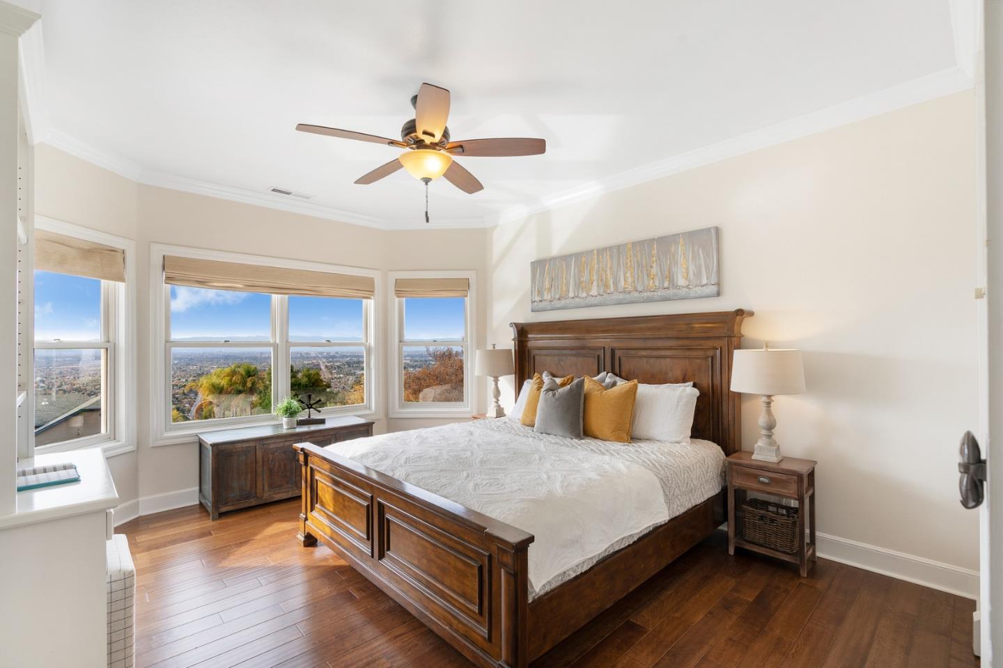 10340 Anderson Road San Jose, CA 95127 - Photo 30 of 65 a bedroom with a bed and a chandelier