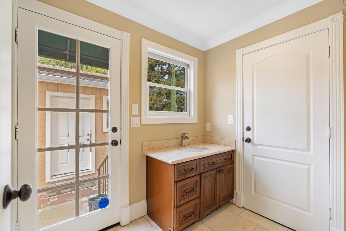 10340 Anderson Road San Jose, CA 95127 - Photo 36 of 65 a bathroom with a sink and a mirror