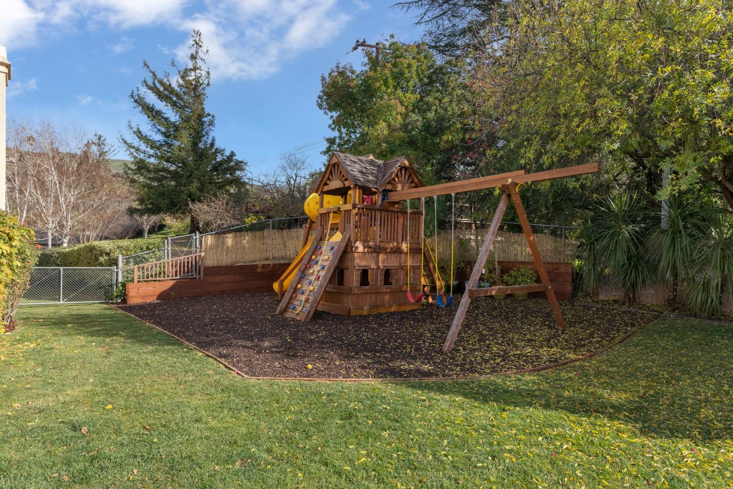 10340 Anderson Road San Jose, CA 95127 - Photo 39 of 65 a view of a yard with a slide