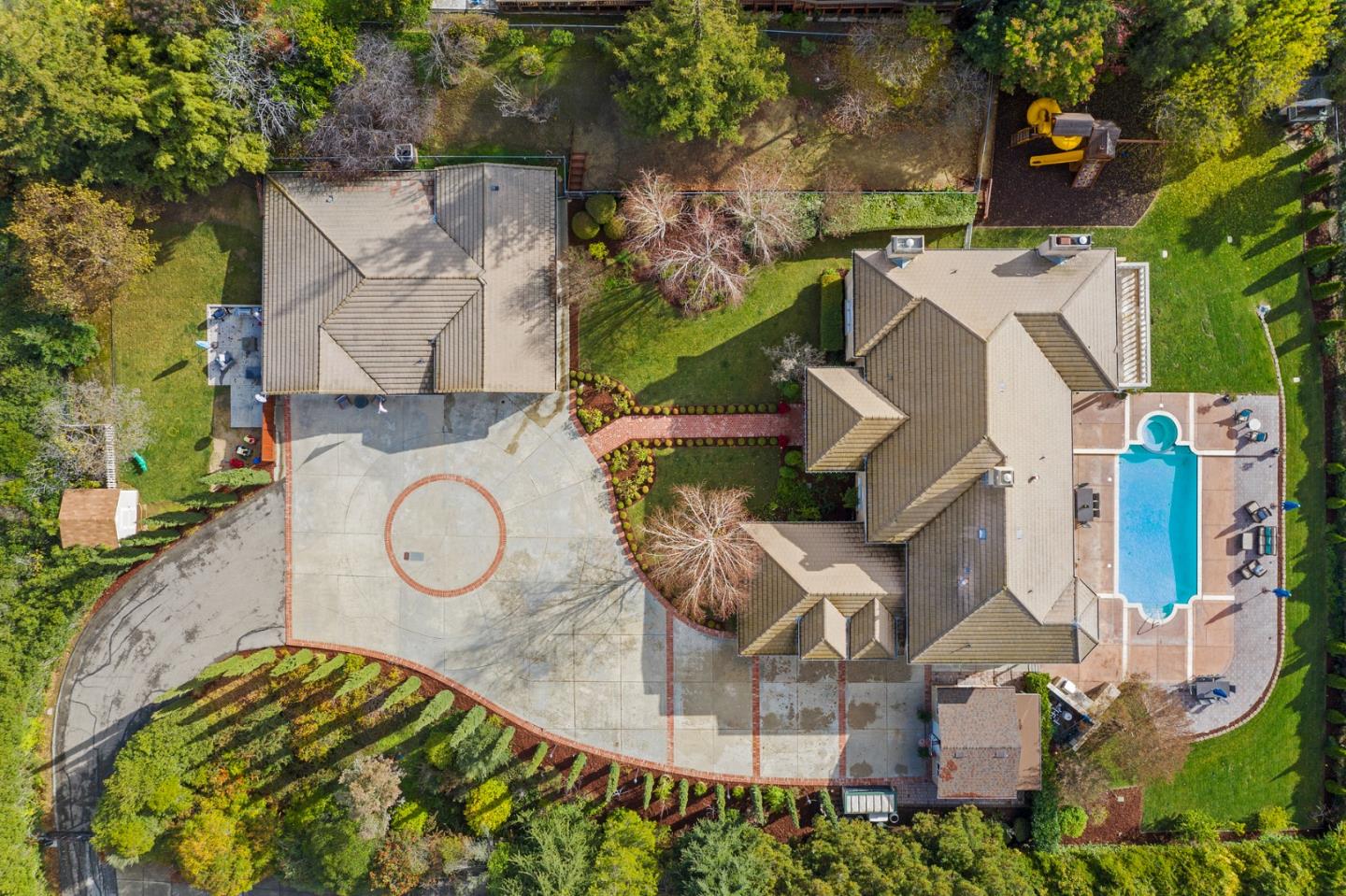 10340 Anderson Road San Jose, CA 95127 - Photo 49 of 65 an aerial view of a house with swimming pool and outdoor seating