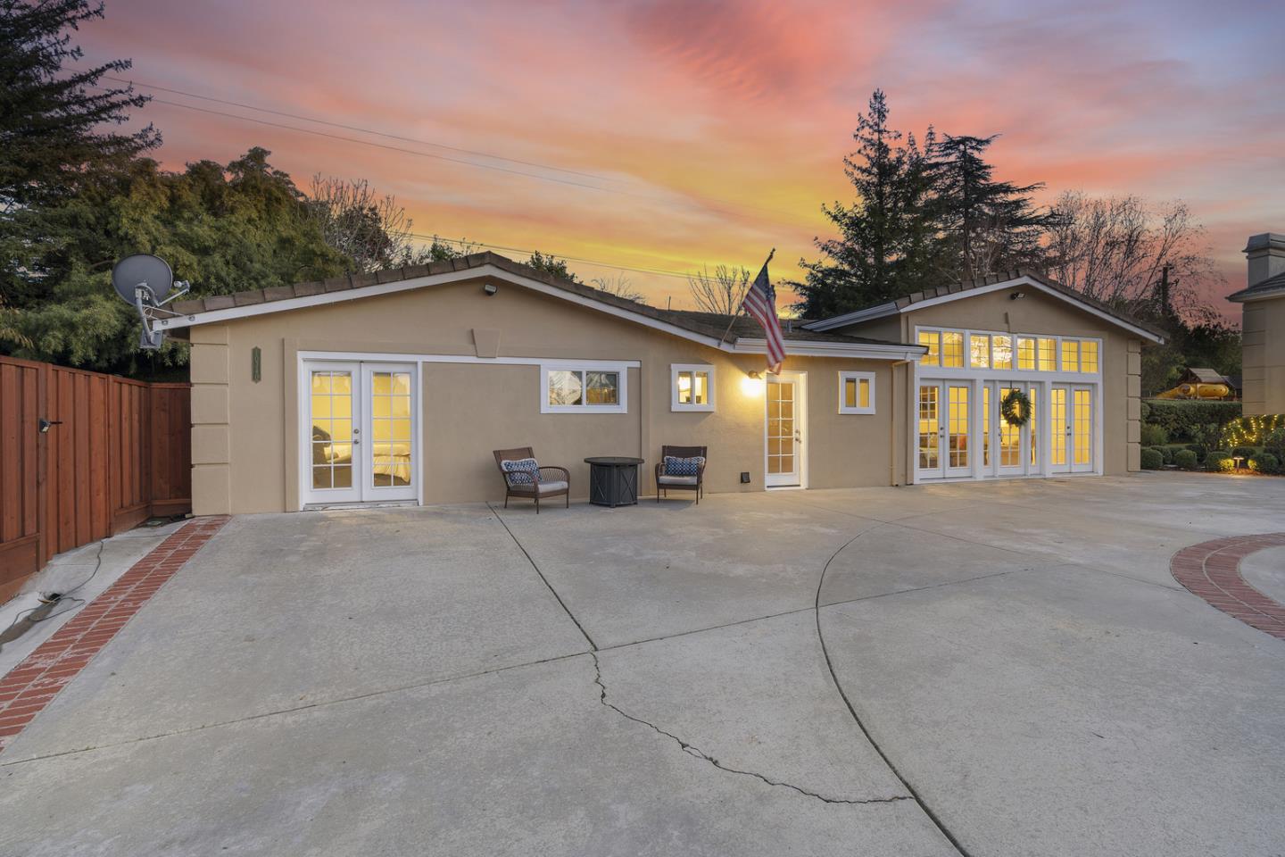 10340 Anderson Road San Jose, CA 95127 - Photo 54 of 65 a front view of a house with a yard and garage