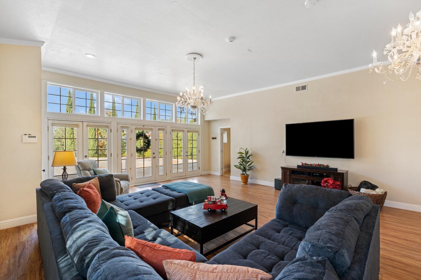 10340 Anderson Road San Jose, CA 95127 - Photo 56 of 65 a living room with furniture and a flat screen tv