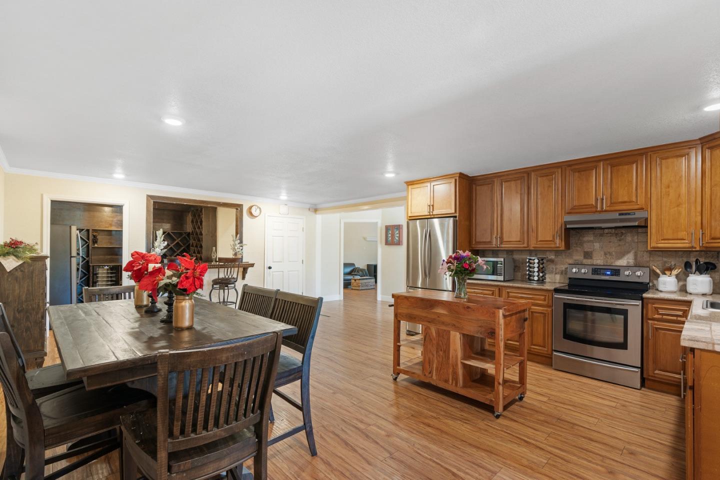 10340 Anderson Road San Jose, CA 95127 - Photo 59 of 65 a view of a dining room with furniture window and wooden floor