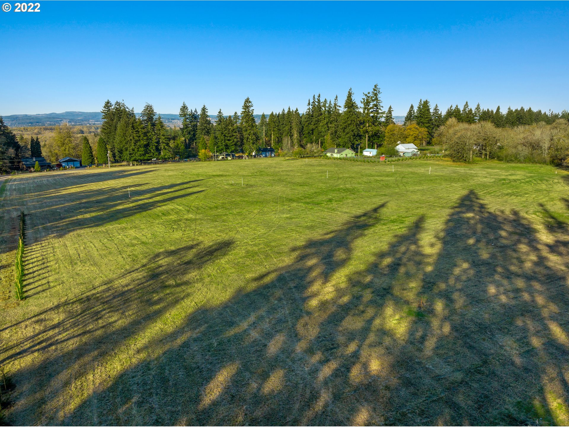 0 Northwest 71st Avenue, Unit 2 Ridgefield, WA 98642 - Photo 5 of 12 a view of a grassy field with trees