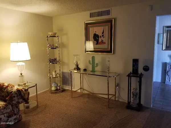 a room with gym equipment and a window