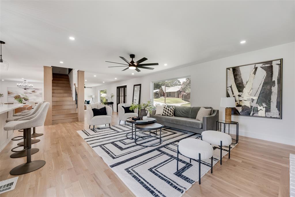 9662 Angleridge Road Dallas, TX 75238 - Photo 12 of 30 a living room with furniture and wooden floor
