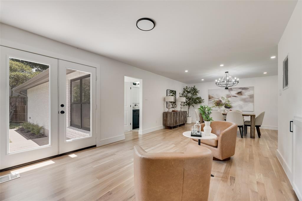 9662 Angleridge Road Dallas, TX 75238 - Photo 18 of 30 a view of a living room and dining room