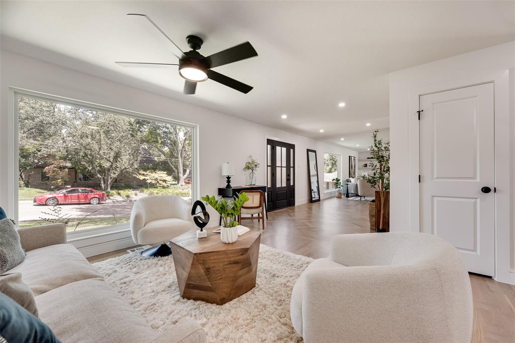 9662 Angleridge Road Dallas, TX 75238 - Photo 9 of 30 a living room with furniture and a large window