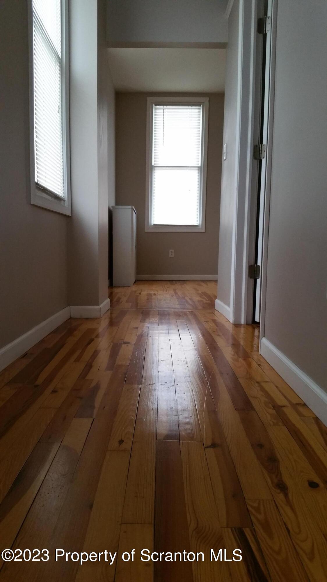 226 Spring Street Moosic, PA 18507 - Photo 23 of 25 a view of wooden floor in an empty room