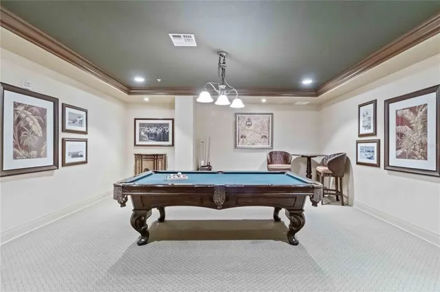 a view of parking garage with cars