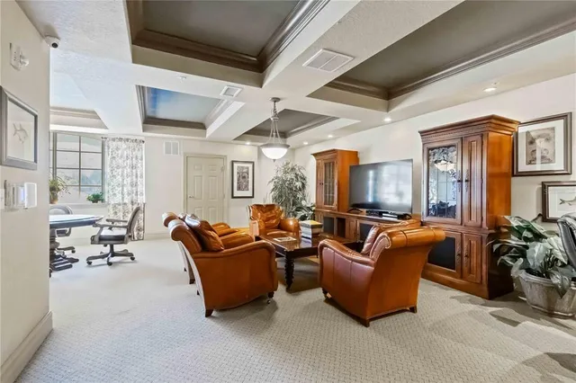 a view of a car parked in front of a building