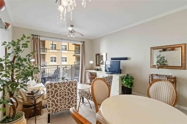 a view of a livingroom with furniture and a flat screen tv