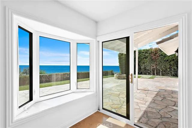 a view of a room with a large window