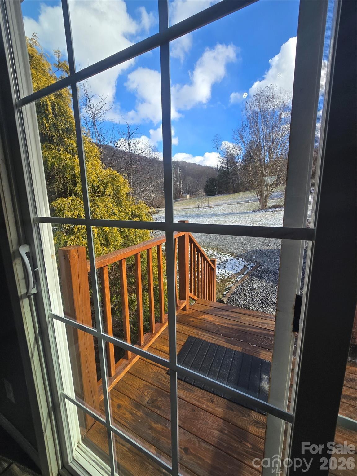 703 Garren Creek Road Fairview, NC 28730 - Photo 16 of 48 a view of a balcony with wooden floor