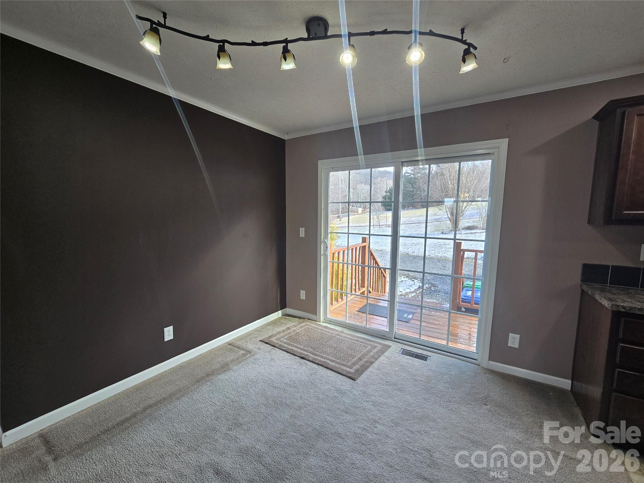 703 Garren Creek Road Fairview, NC 28730 - Photo 18 of 48 a view of an empty room with a window