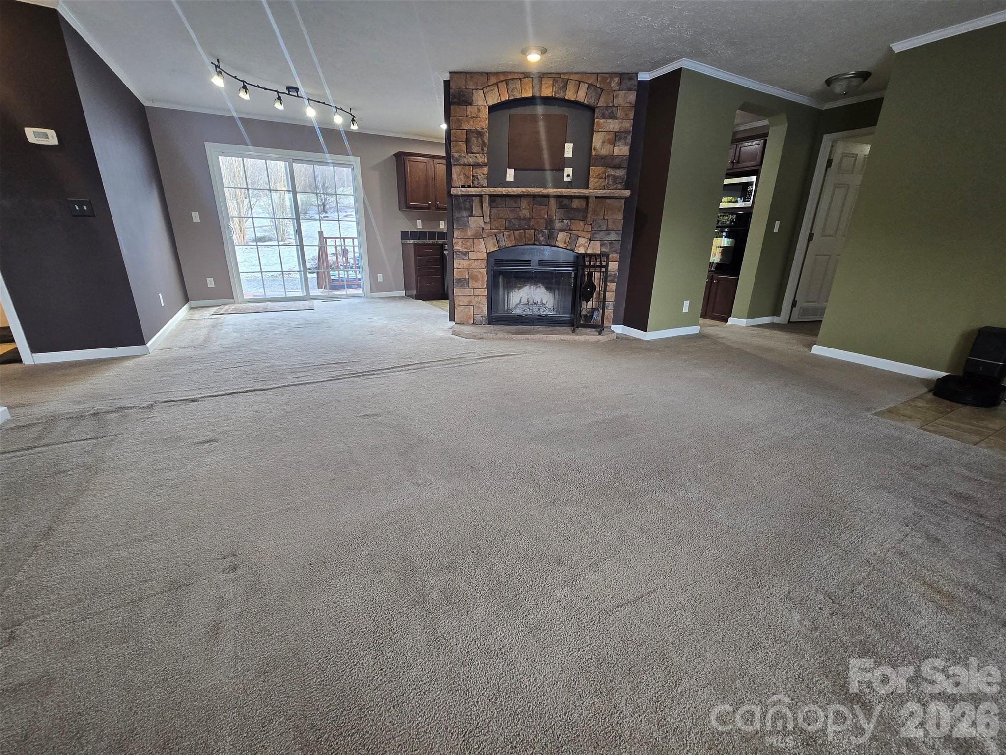 703 Garren Creek Road Fairview, NC 28730 - Photo 28 of 48 a view of a livingroom with furniture and a window